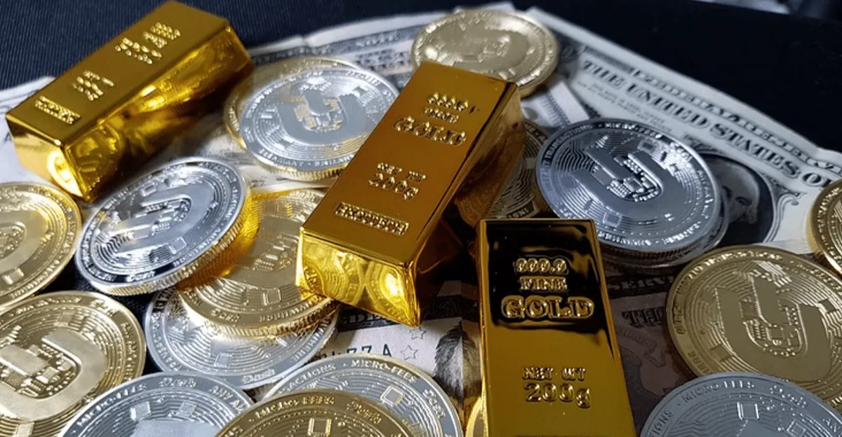 Zlato je pod tlakom silného dolára a vyšších cien ropy - Reuters