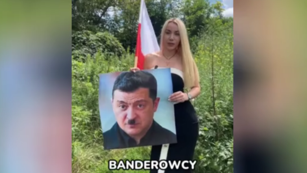 Poľska politička vyhodila portrét „Hitlera“ Zelenského do koša (VIDEO) Poľska politička vyhodila portrét „Hitlera“ Zelenského do koša (VIDEO)